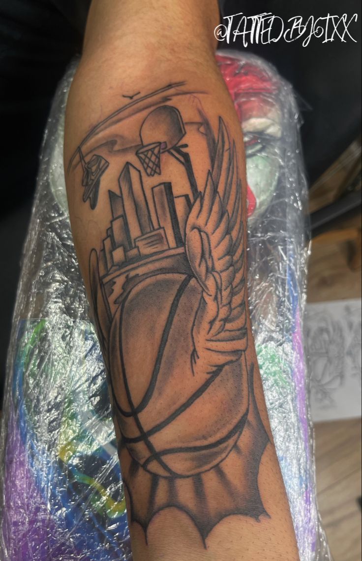 artistic basketball-themed tattoos