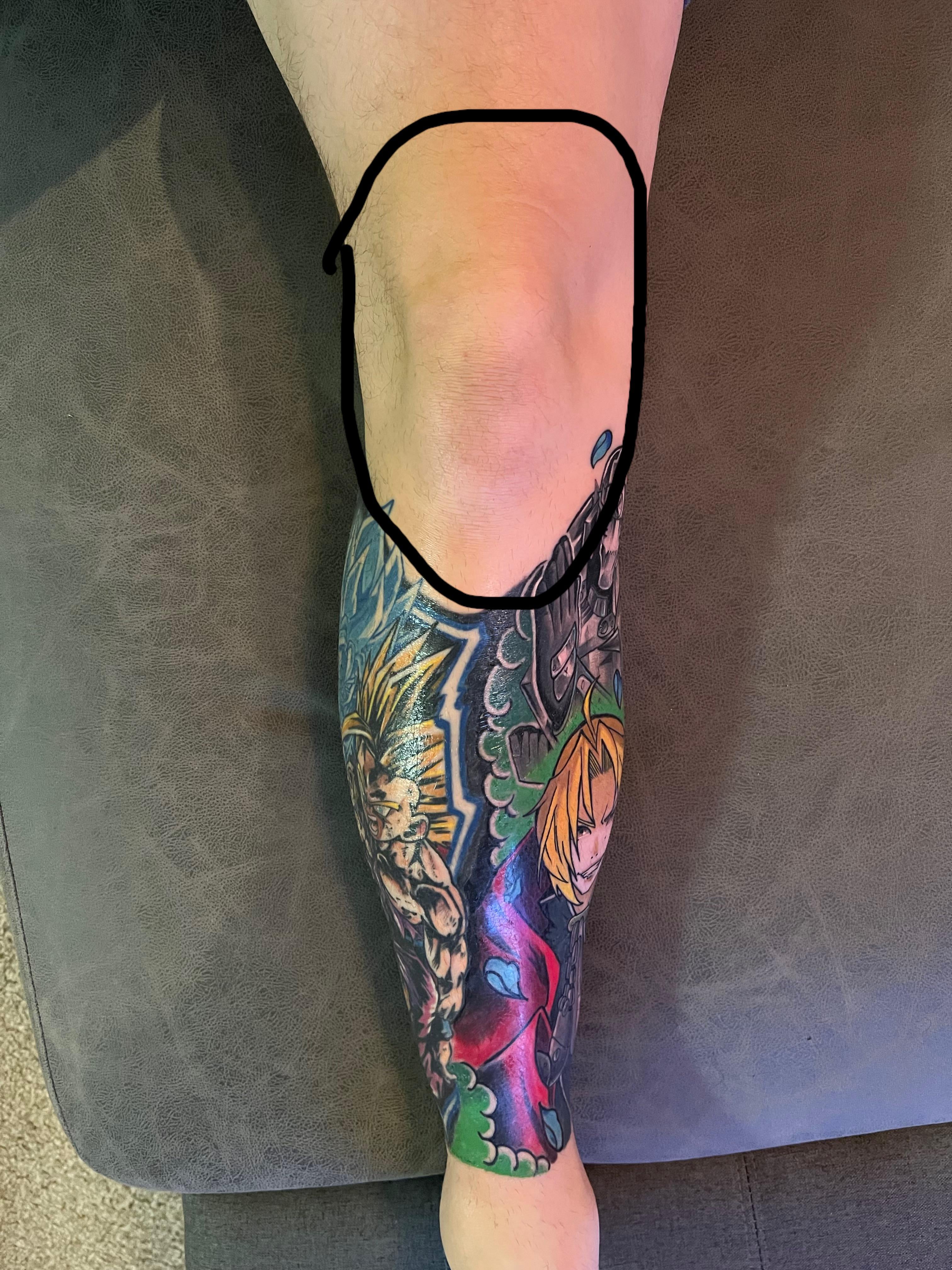 artistic knee tattoo motifs