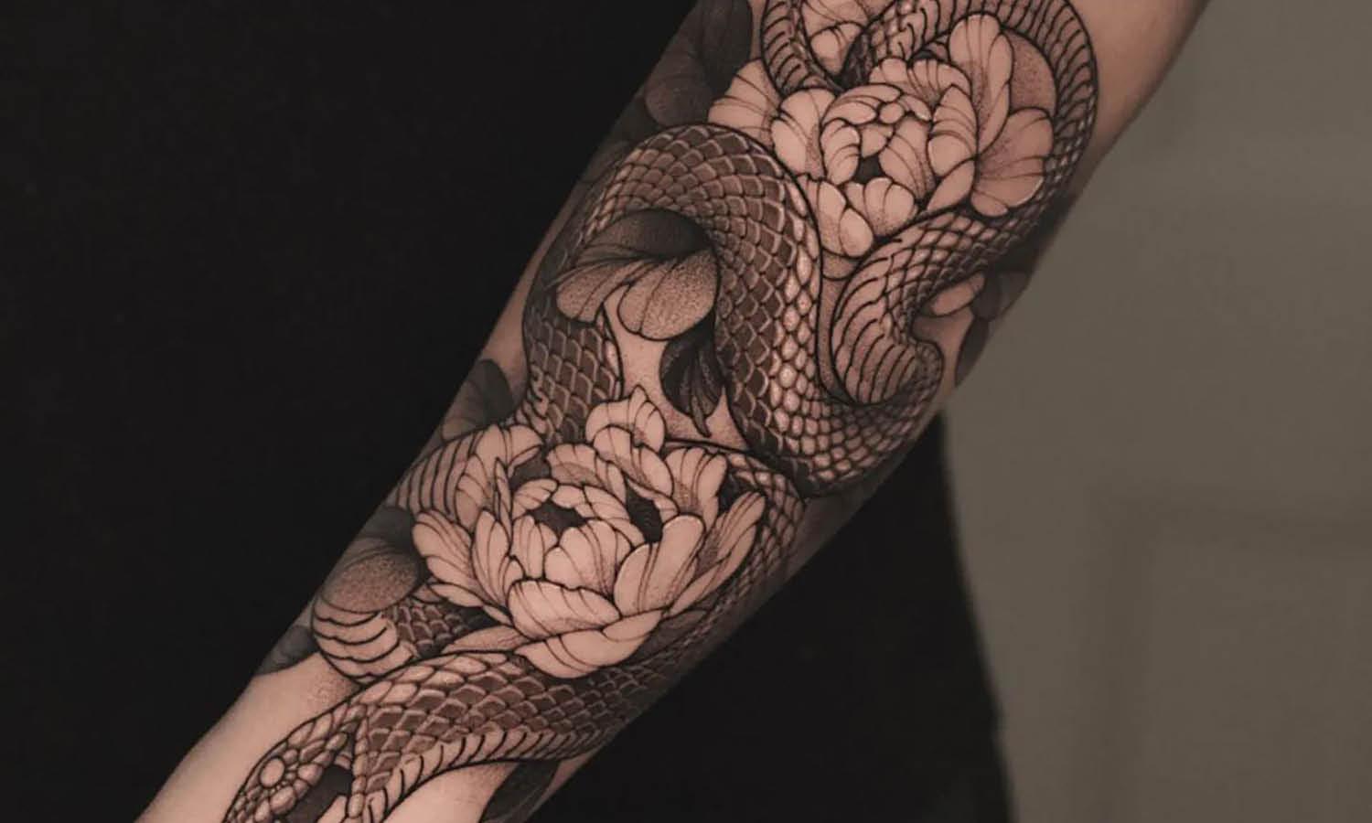 artistic lower arm tattoo ideas for guys