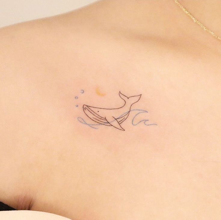 artistic small dolphin tattoo interpretations