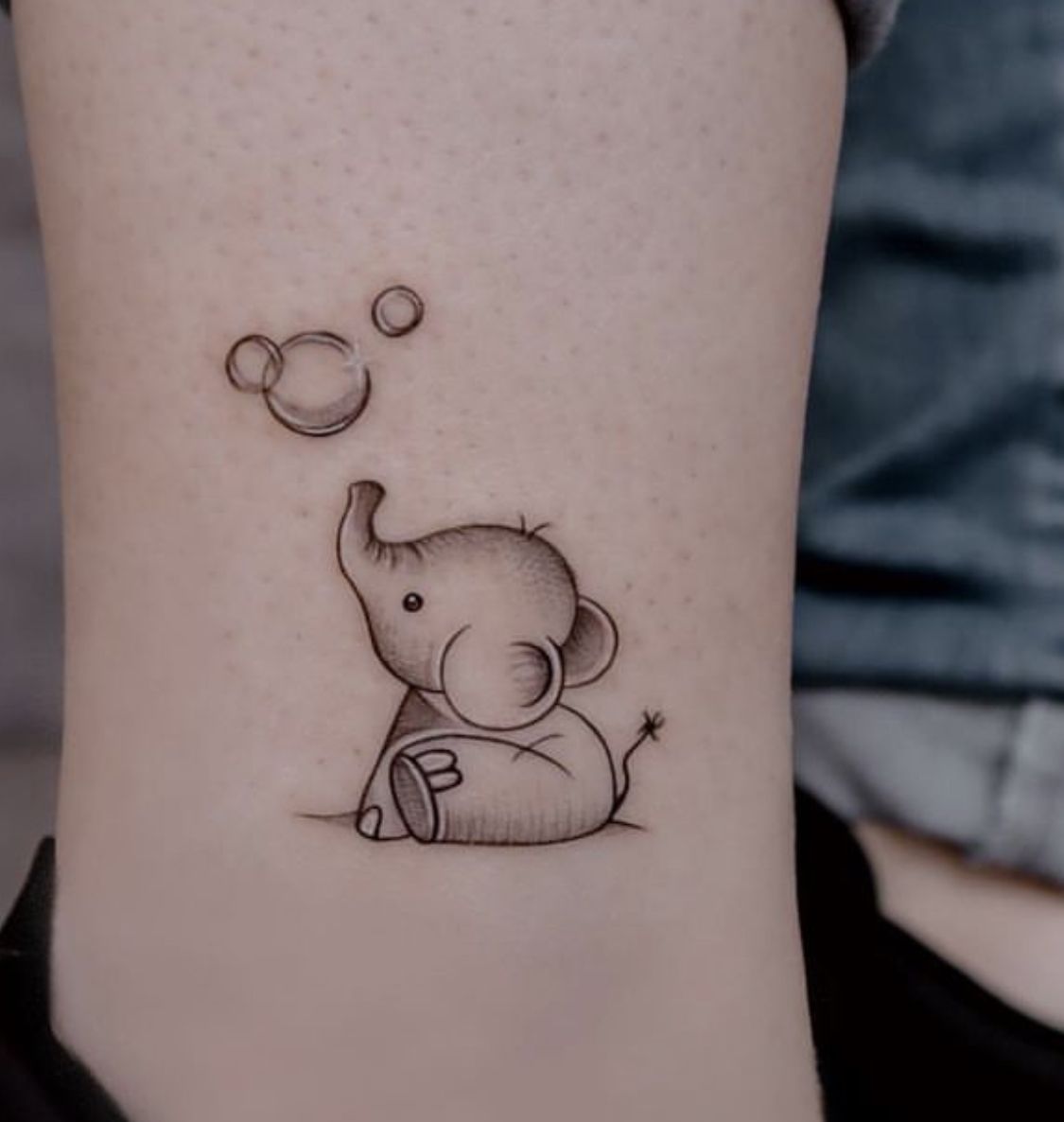 artistic small elephant tattoo options