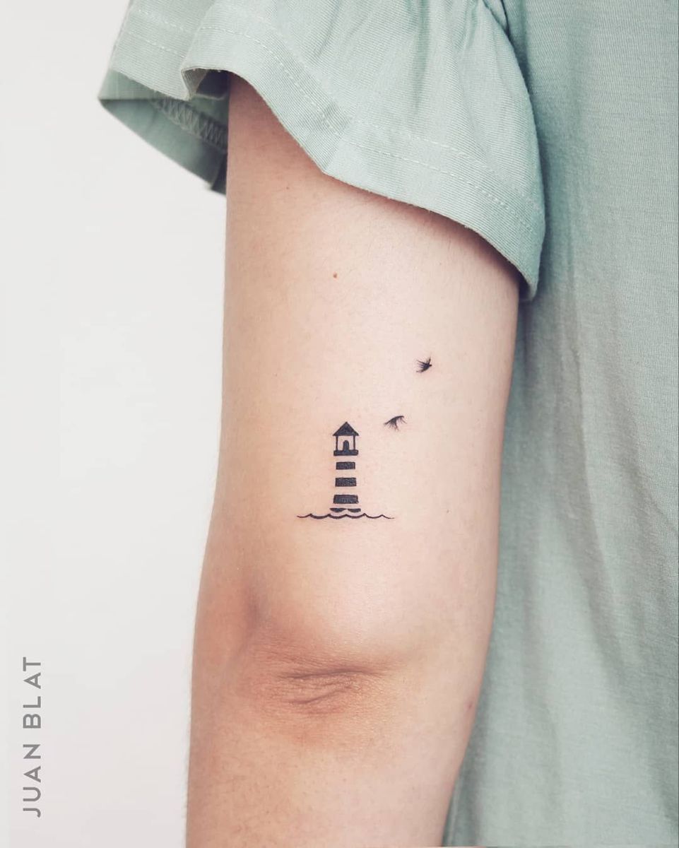 Artistic variations of small lighthouse tattoo