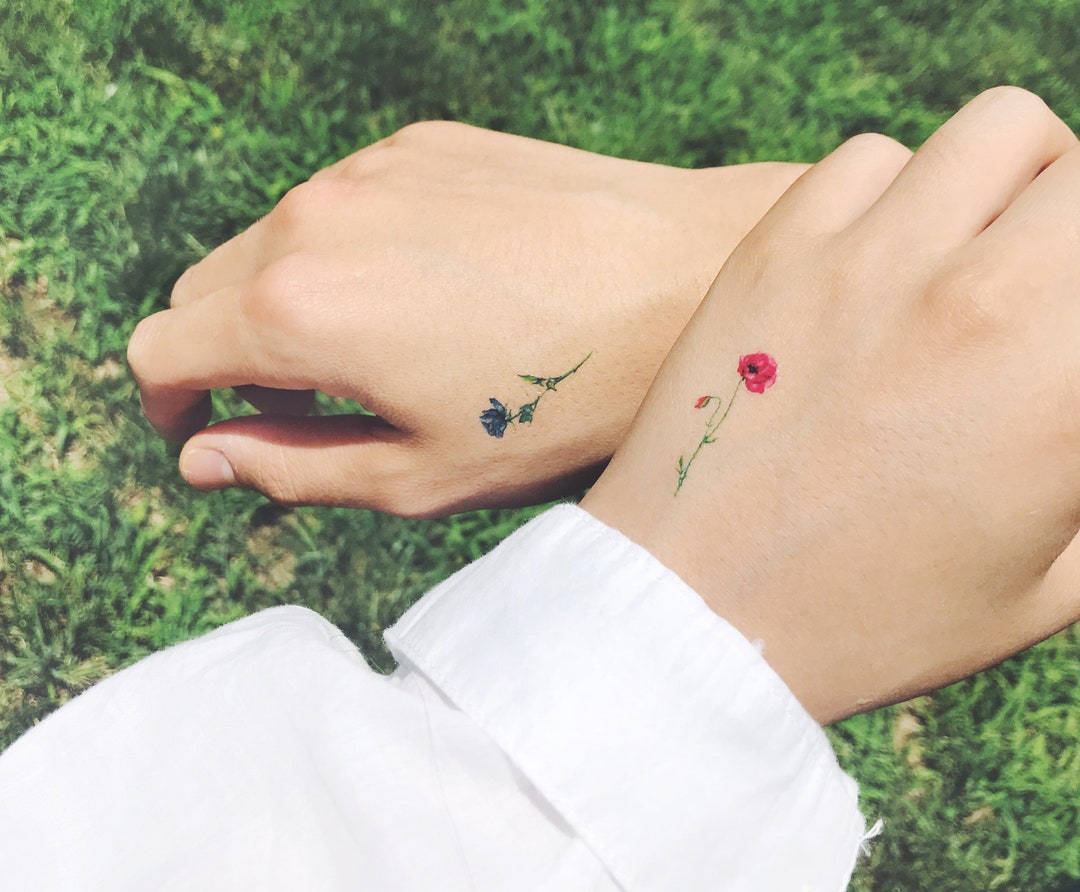 artistic wrist poppy tattoo variations