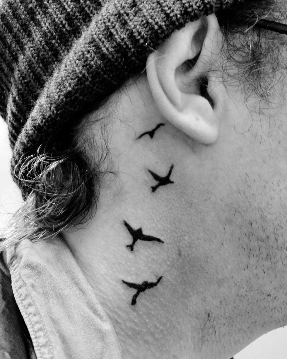 bold neck tattoo ideas for men