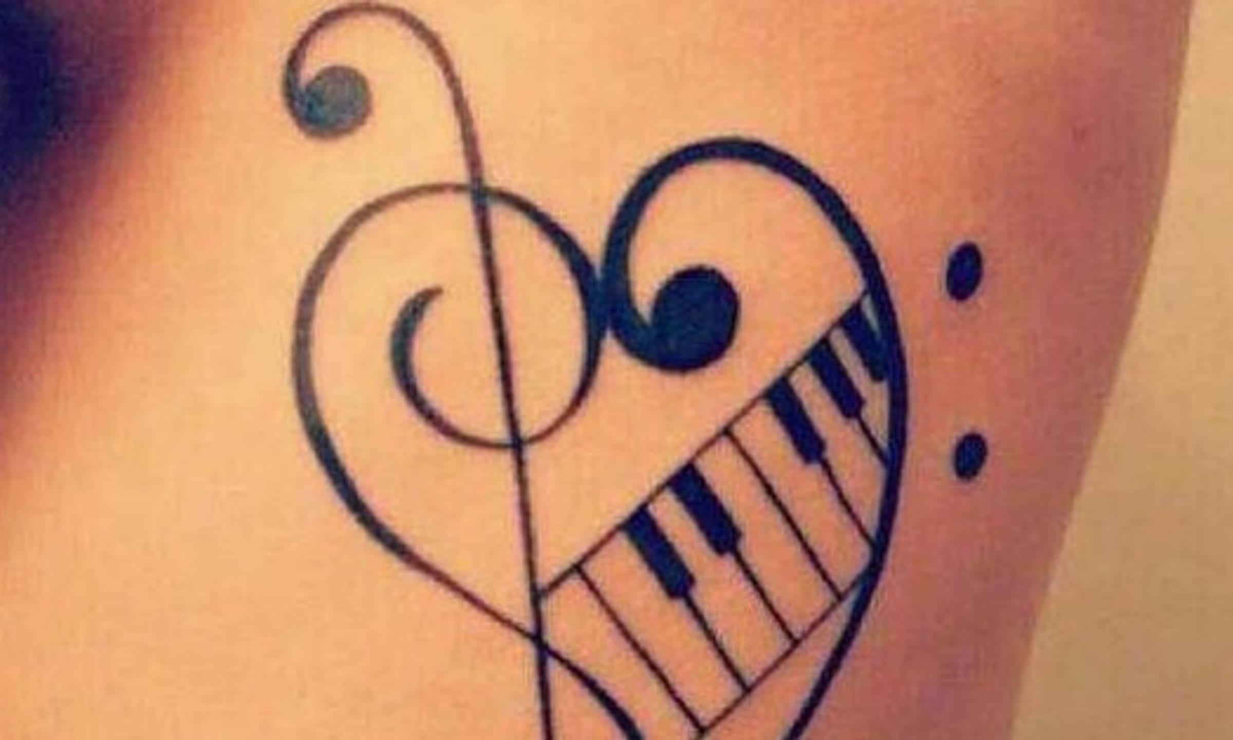 colorful music notes tattoo variations