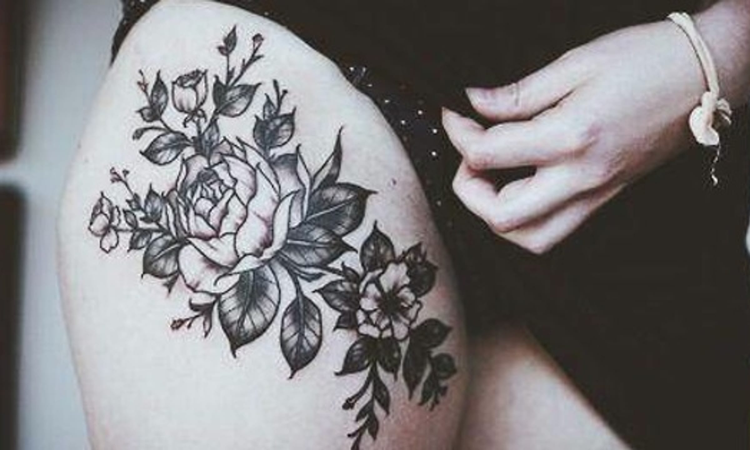 colorful upper thigh tattoo illustrations