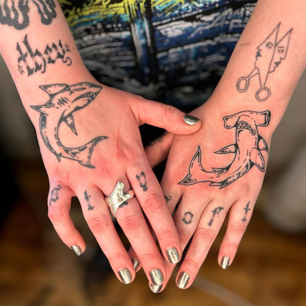 creative hand tattoo ideas