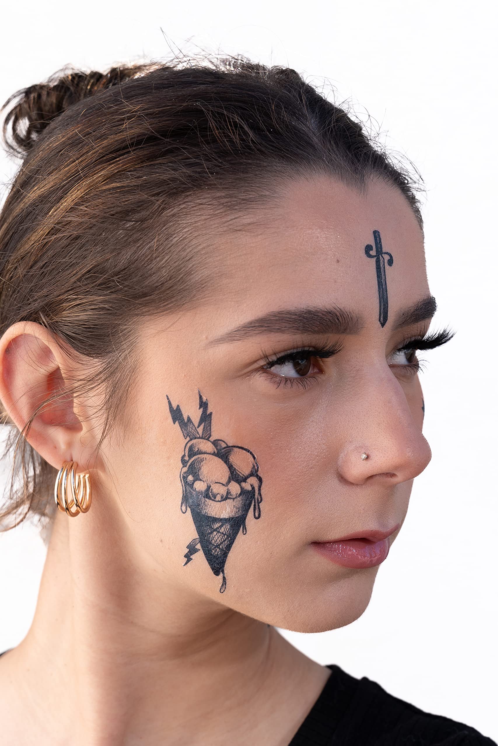 creative small cross face tattoo inspirations