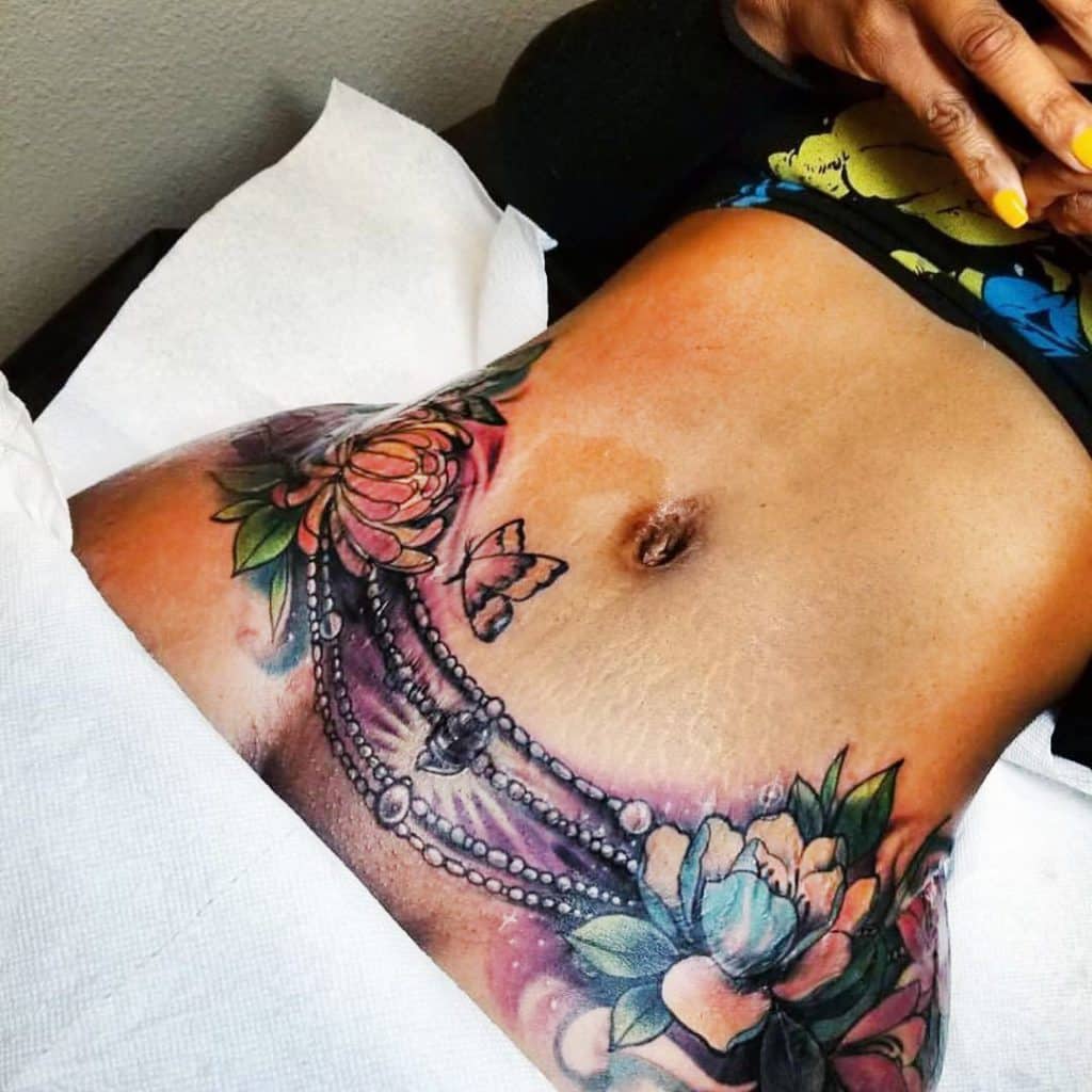 creative tummy tuck tattoo designs