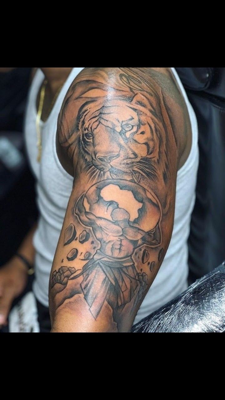 creative upper sleeve tattoo ideas for black men