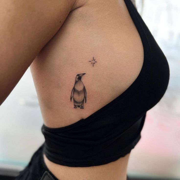 cute small penguin tattoo concepts