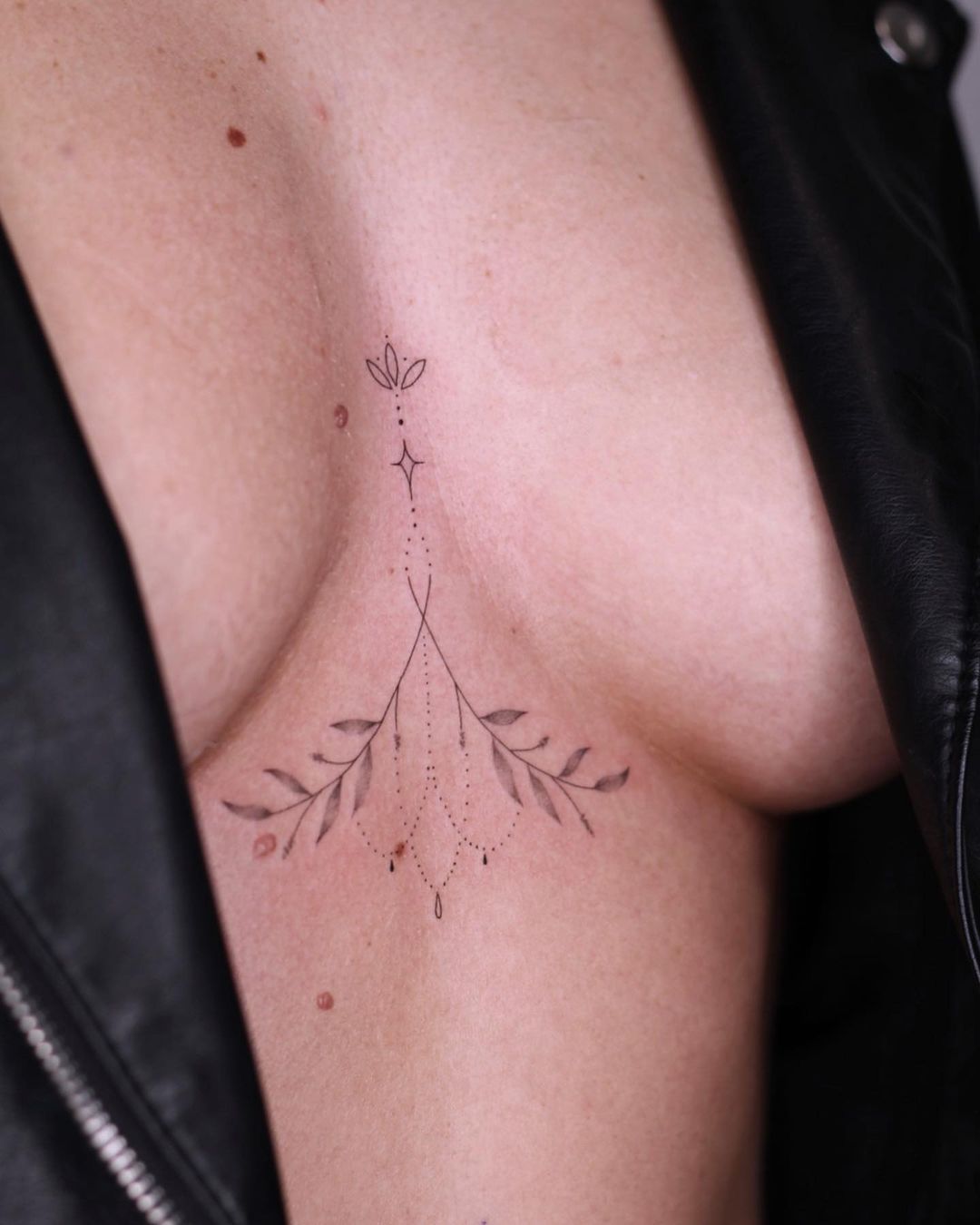 cute small sternum tattoo 0015