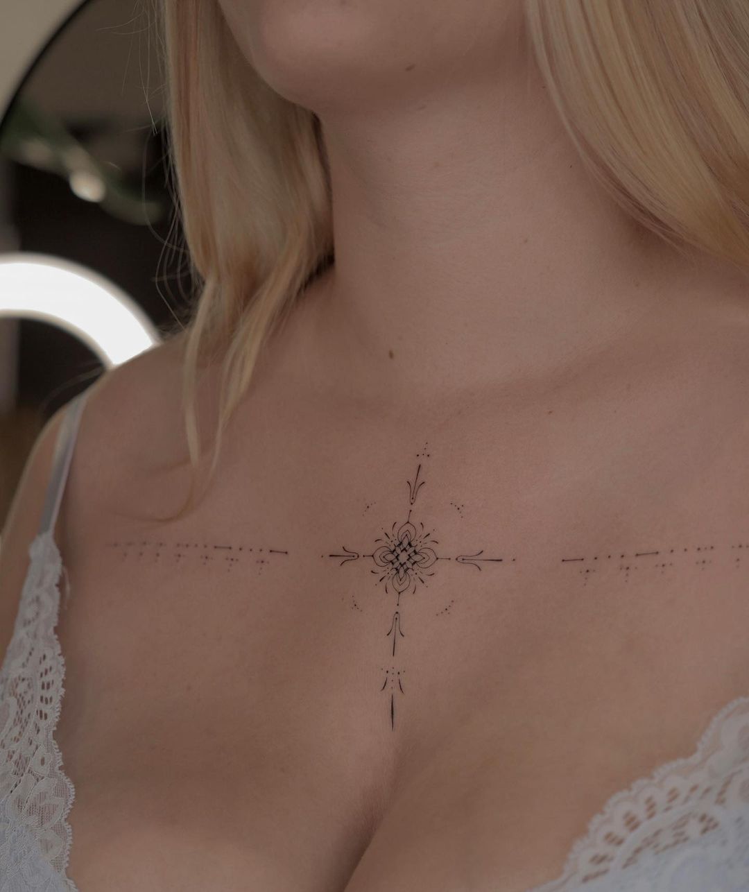 cute small sternum tattoo 0021