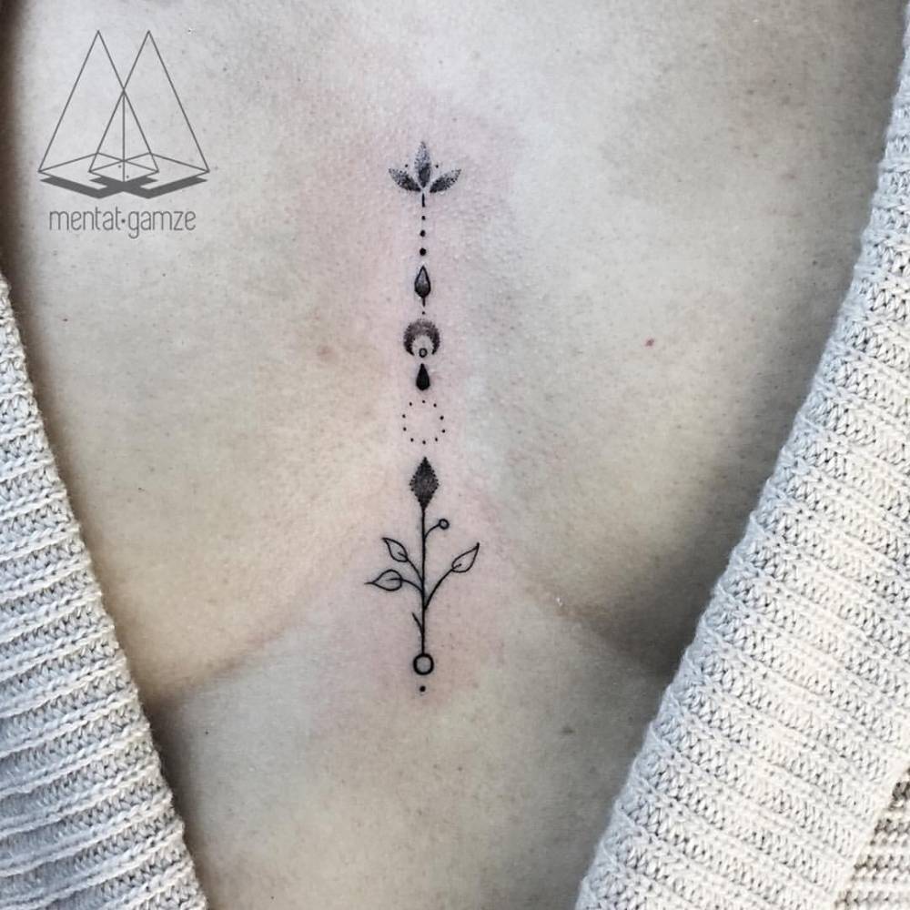 cute small sternum tattoo 0024