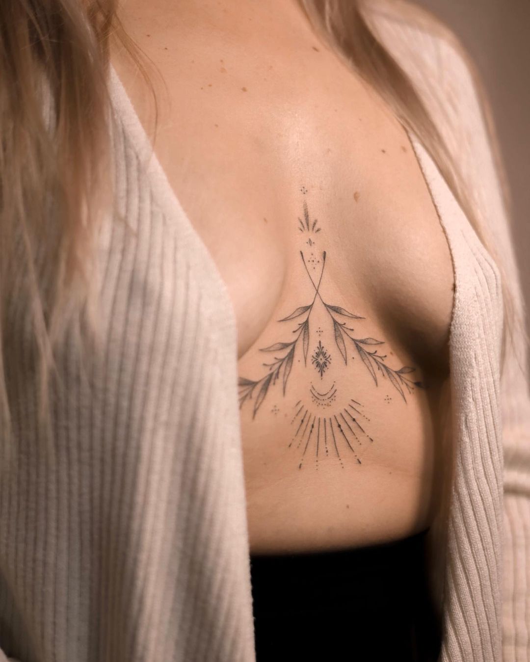 cute small sternum tattoo 0035