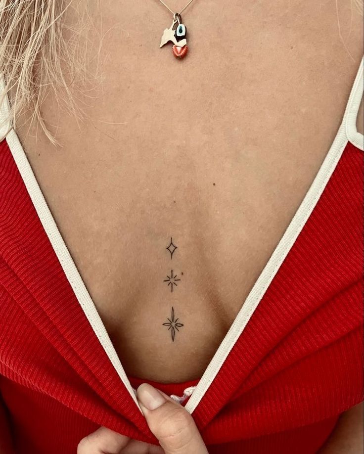 cute small sternum tattoo 0043