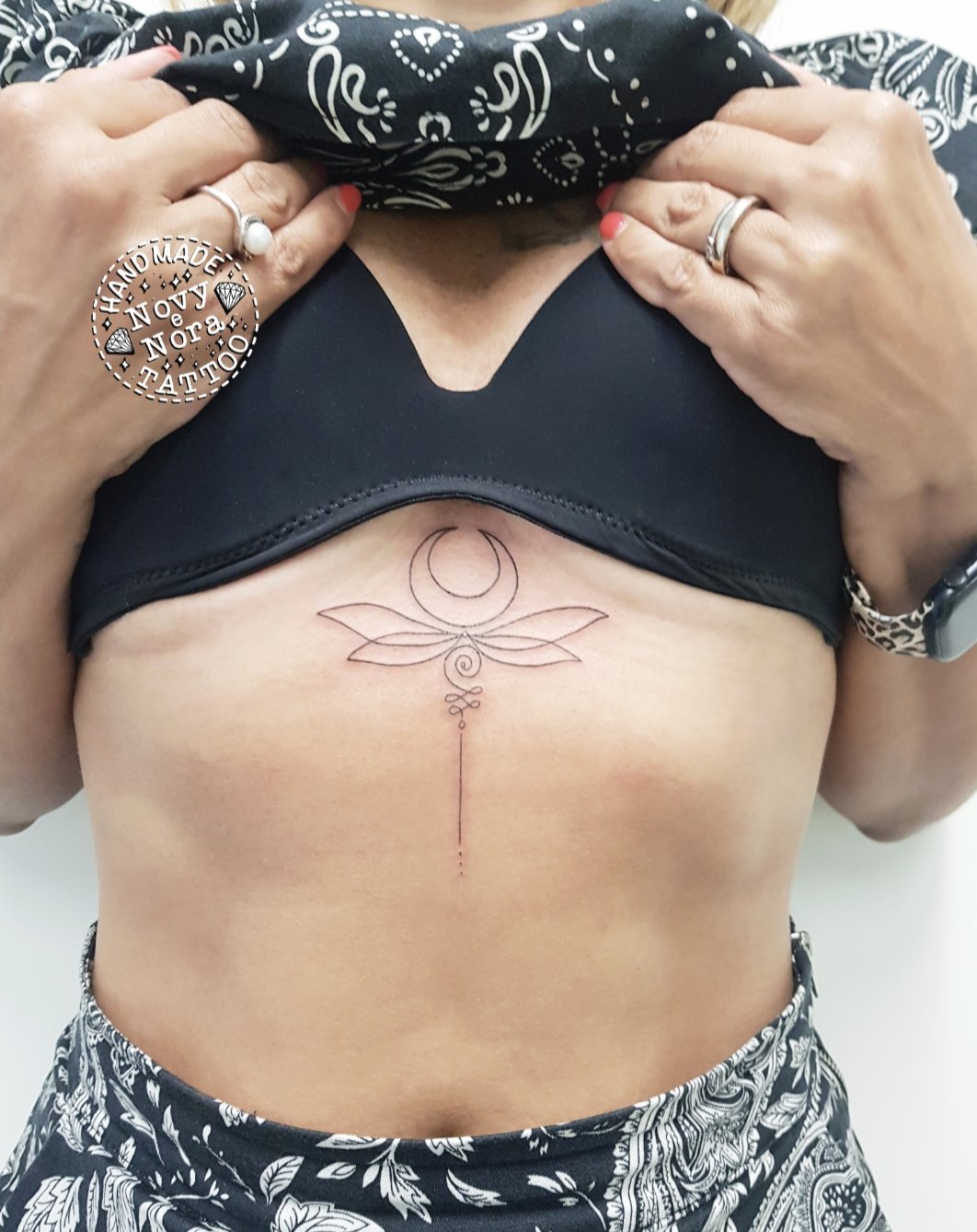 cute small sternum tattoo 0048