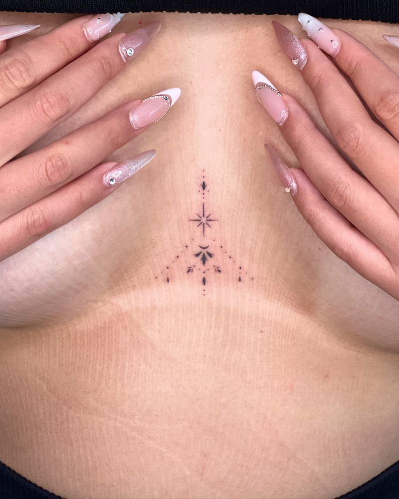 cute small sternum tattoo 0053