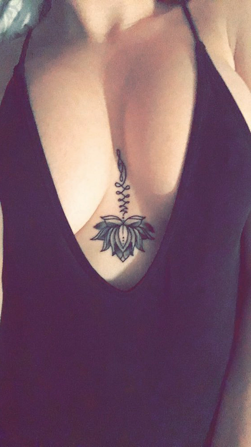 cute small sternum tattoo 0054