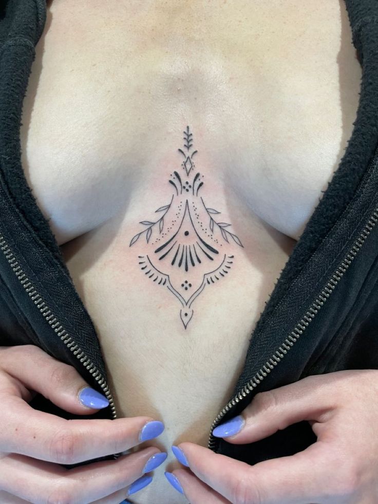 cute small sternum tattoo 0056