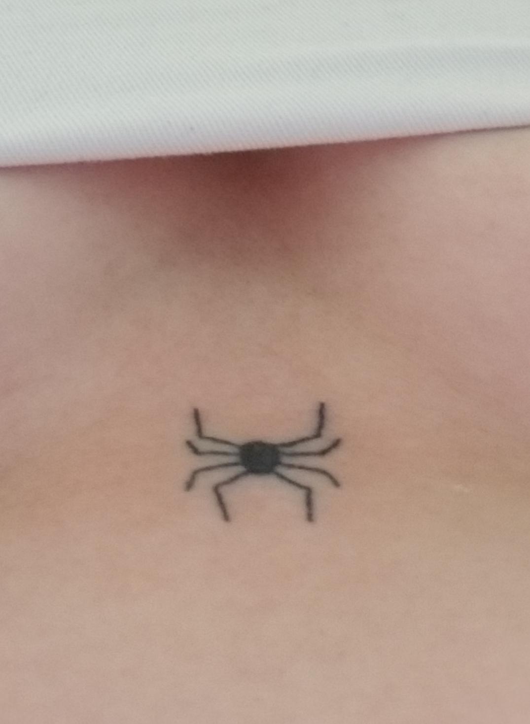 cute small sternum tattoo 0059