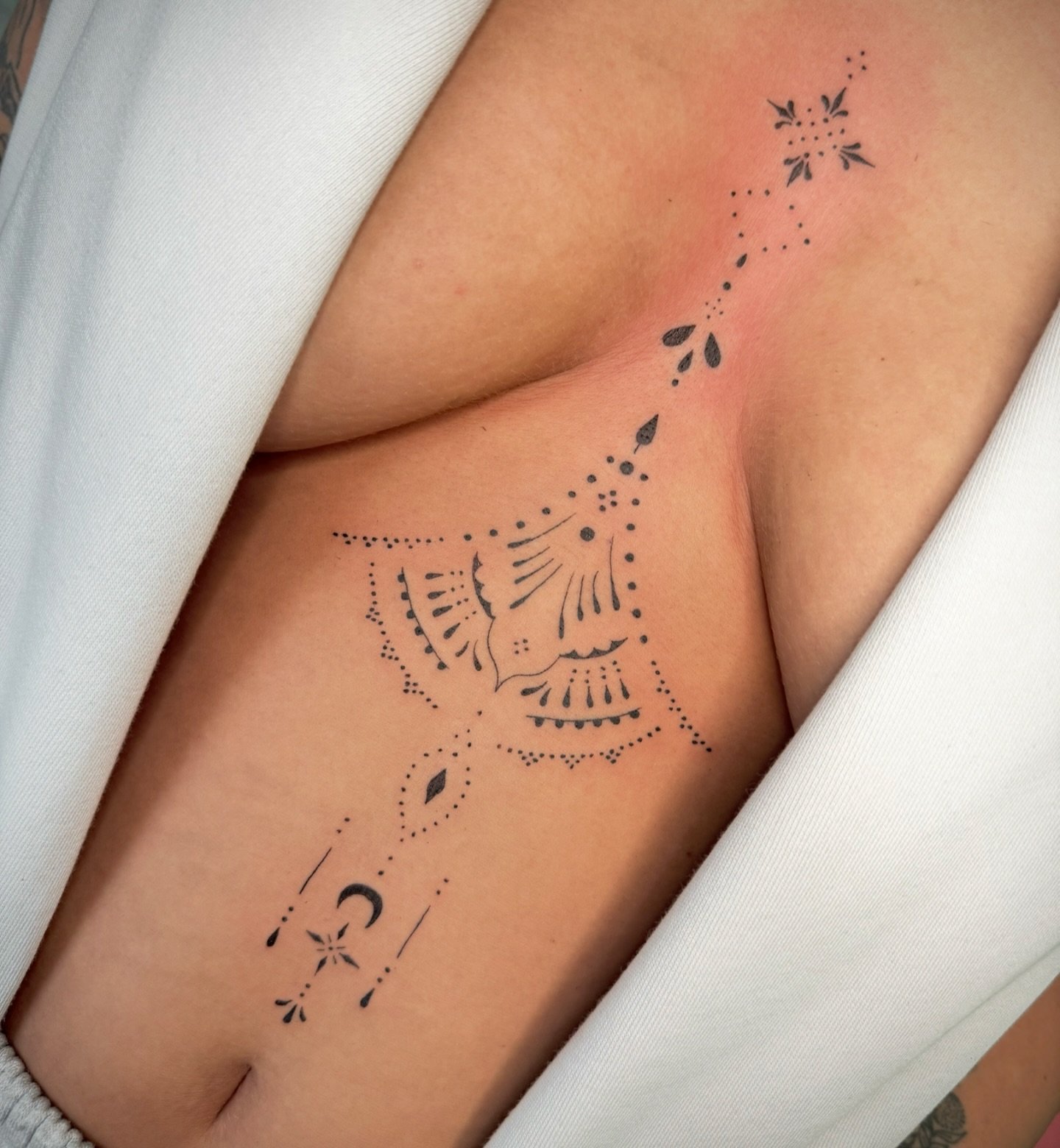 cute small sternum tattoo 0084