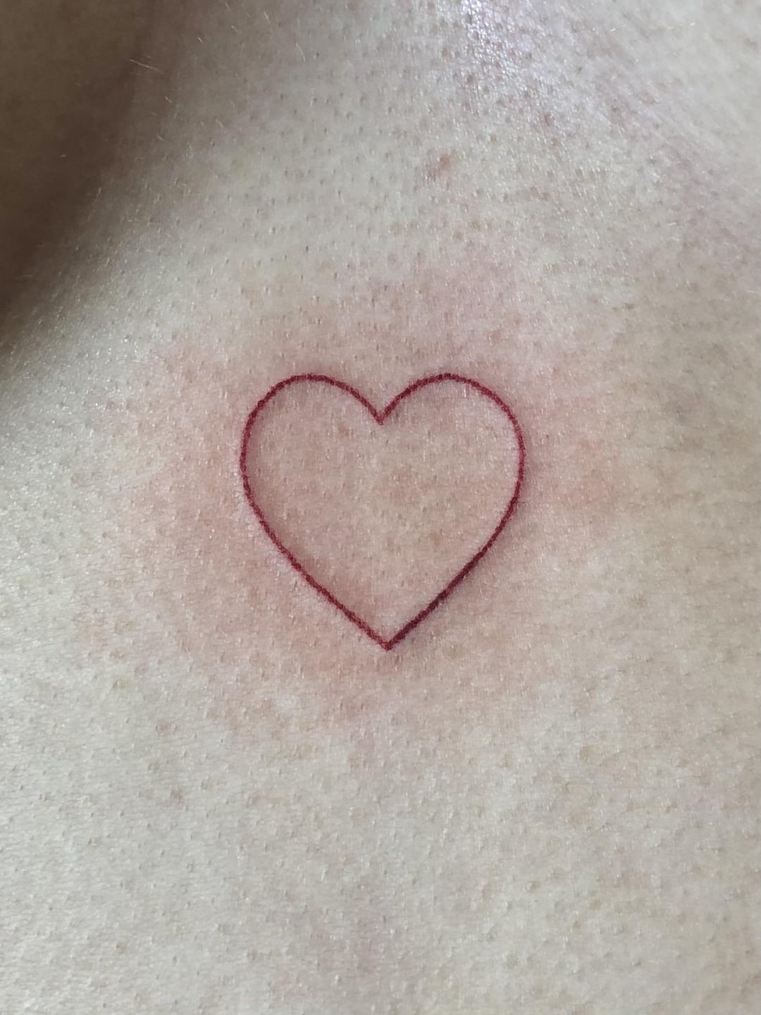 cute small sternum tattoo 0086