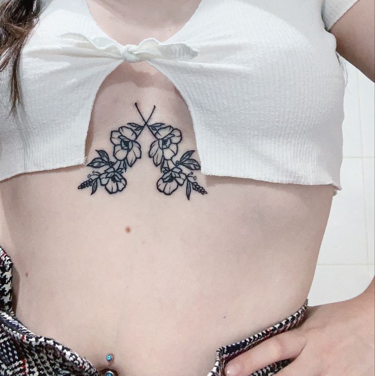 cute small sternum tattoo 0098