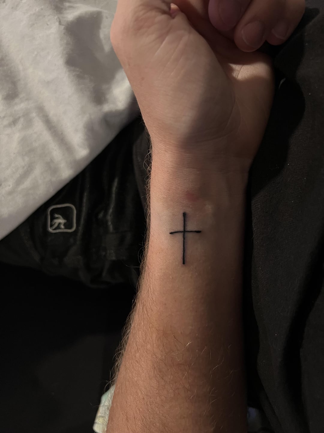 delicate cross tattoos for wrist