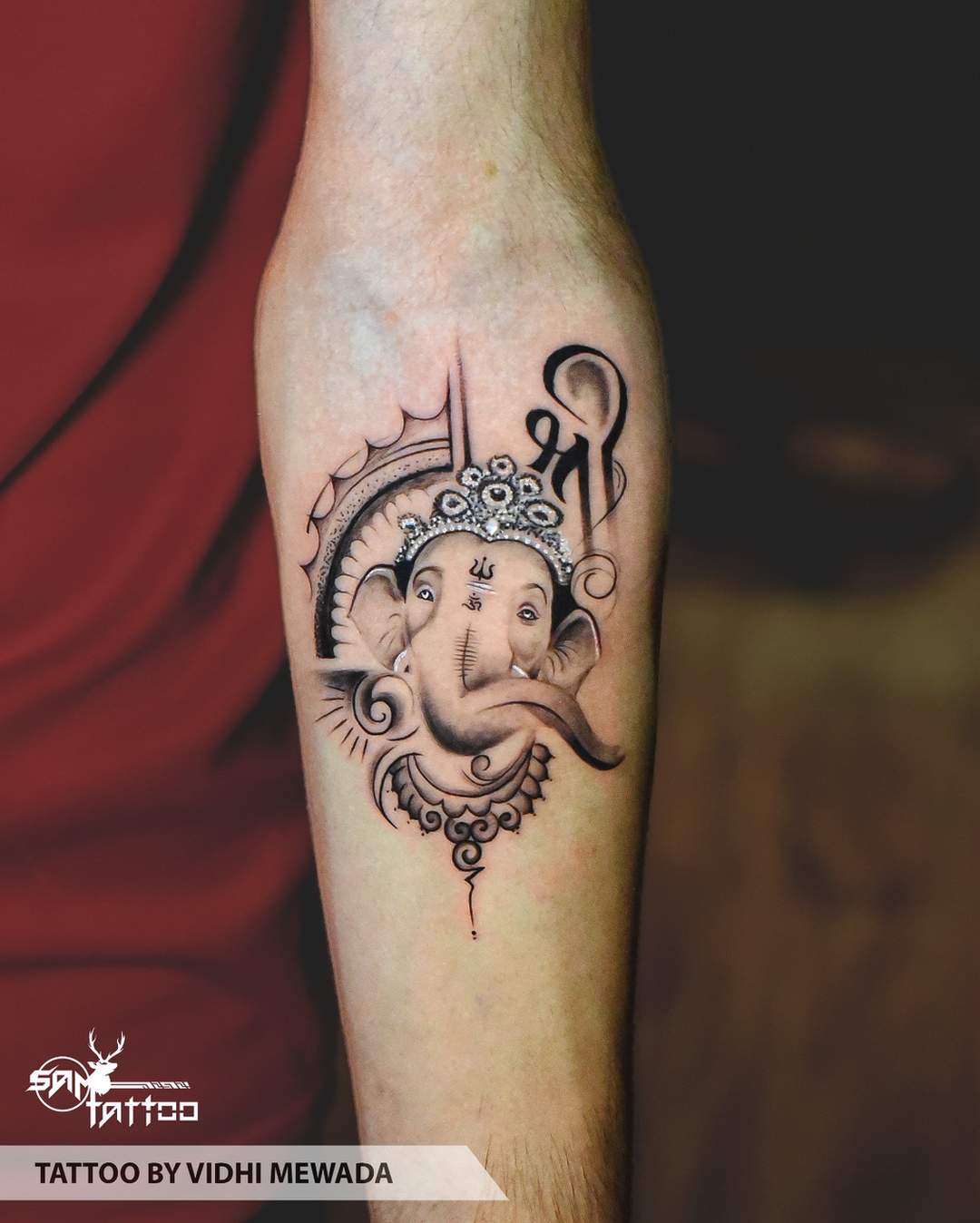 delicate Ganesha tattoo ideas for wrists