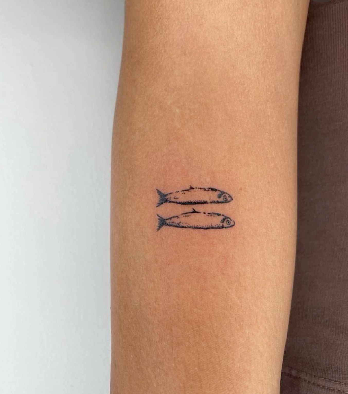 delicate small fish tattoo styles