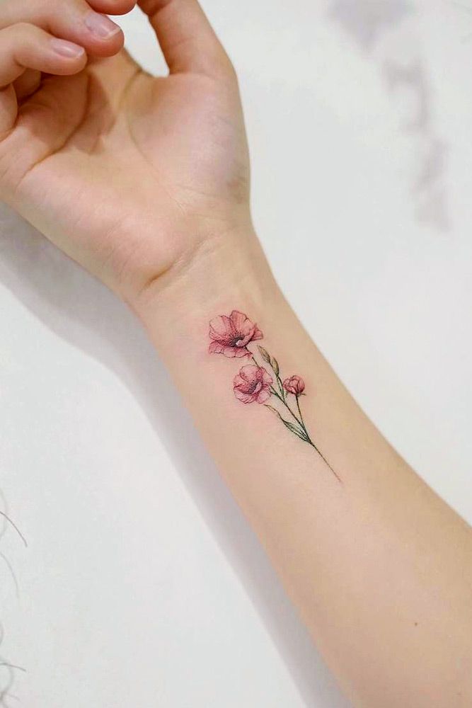 delicate small poppy tattoo meanings.