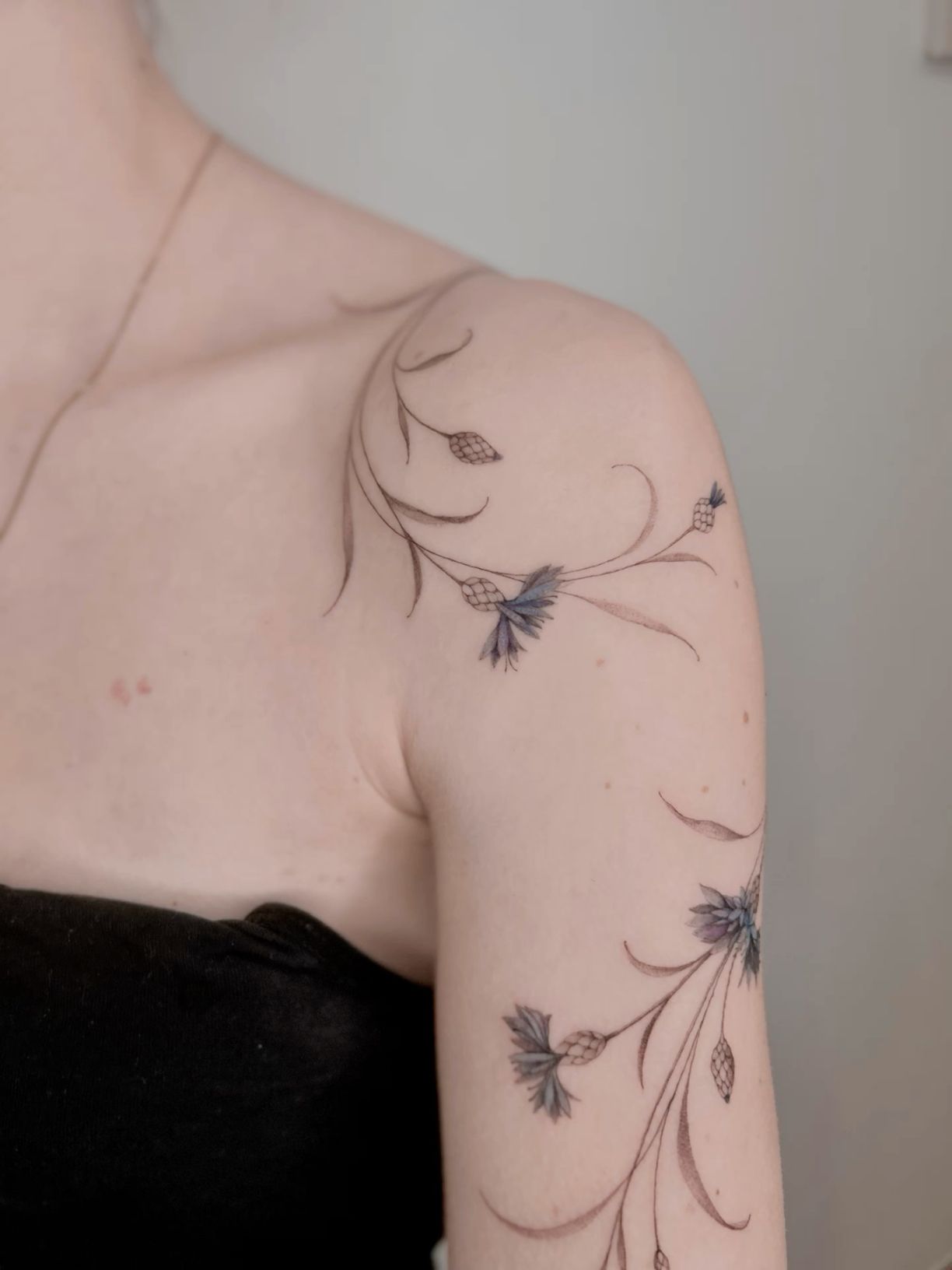 delicate wildflower tattoo ideas