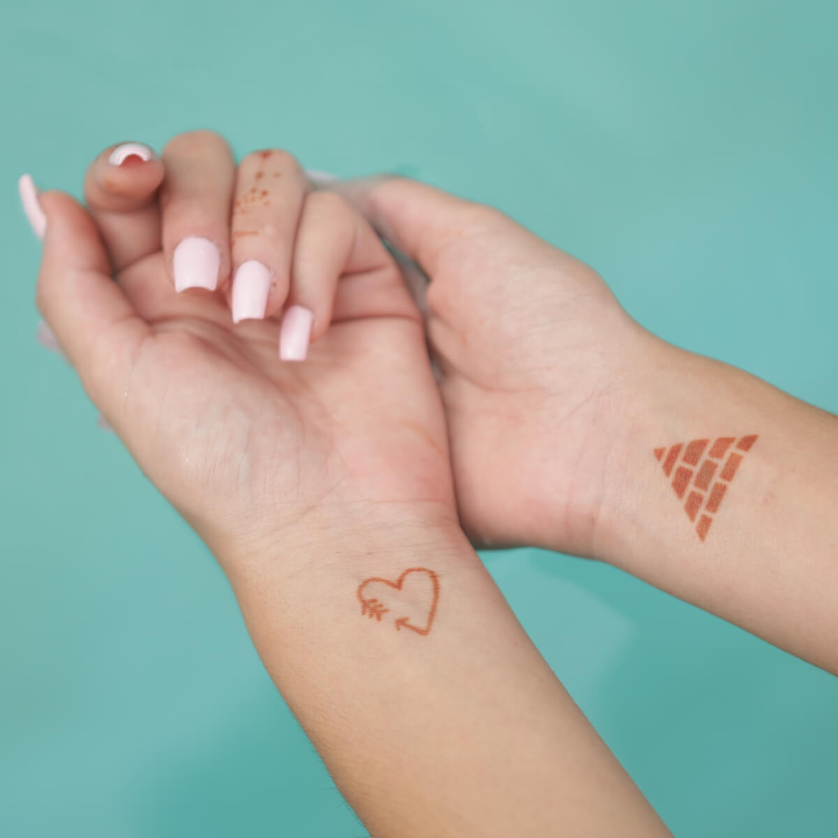 easy wrist small henna tattoo