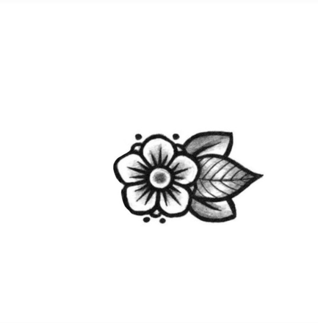 elegant small black rose tattoo motifs