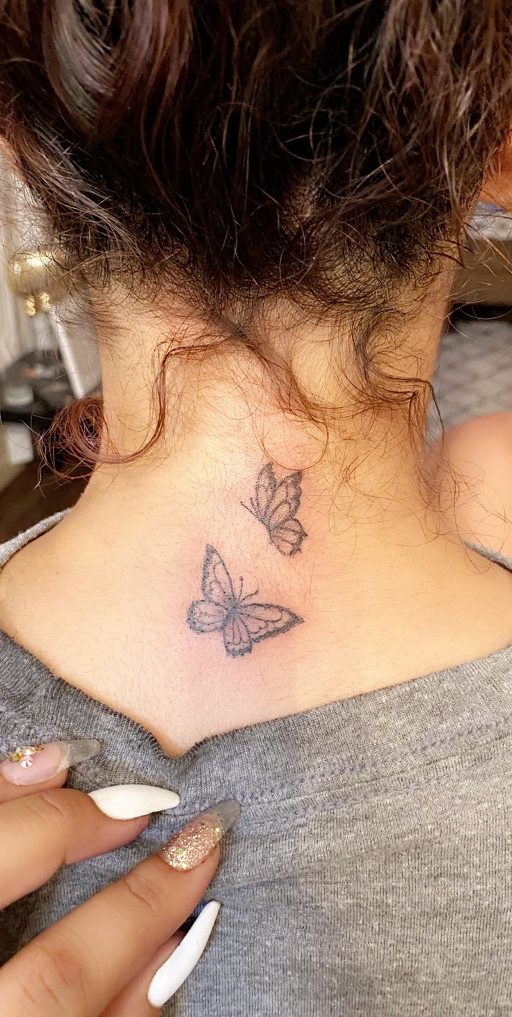 elegant small butterfly neck tattoo ideas