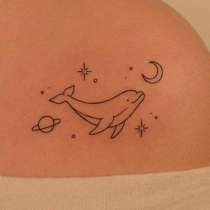 elegant small dolphin tattoo examples