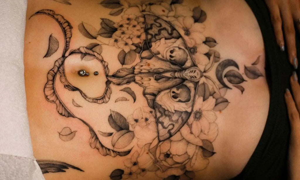 Elegant small tattoos for abdomen placement