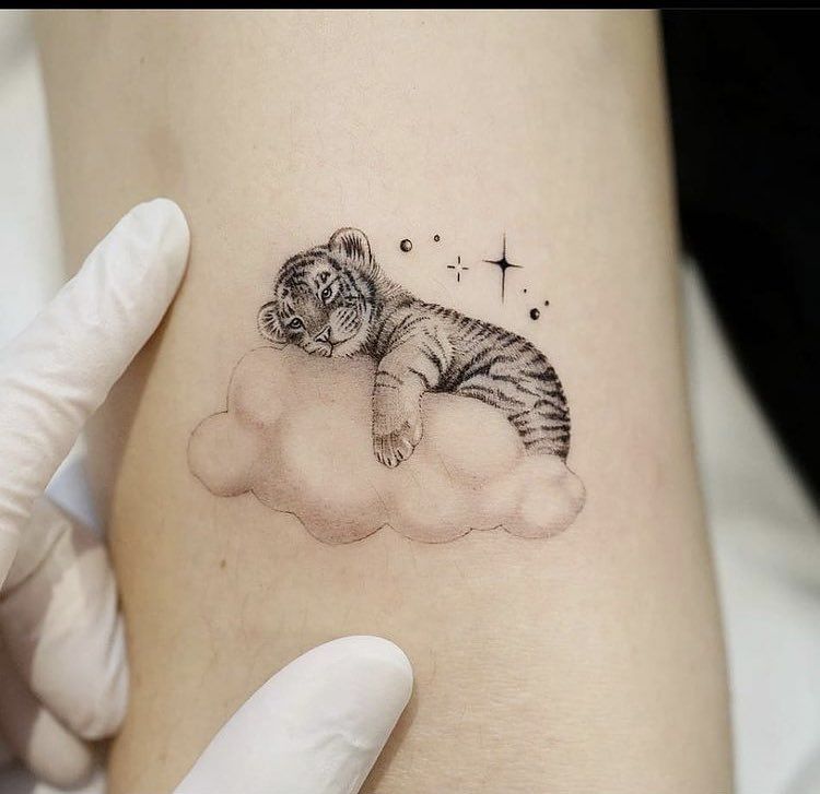 elegant small tiger tattoo inspiration