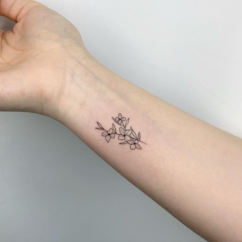 elegant small wrist tattoos