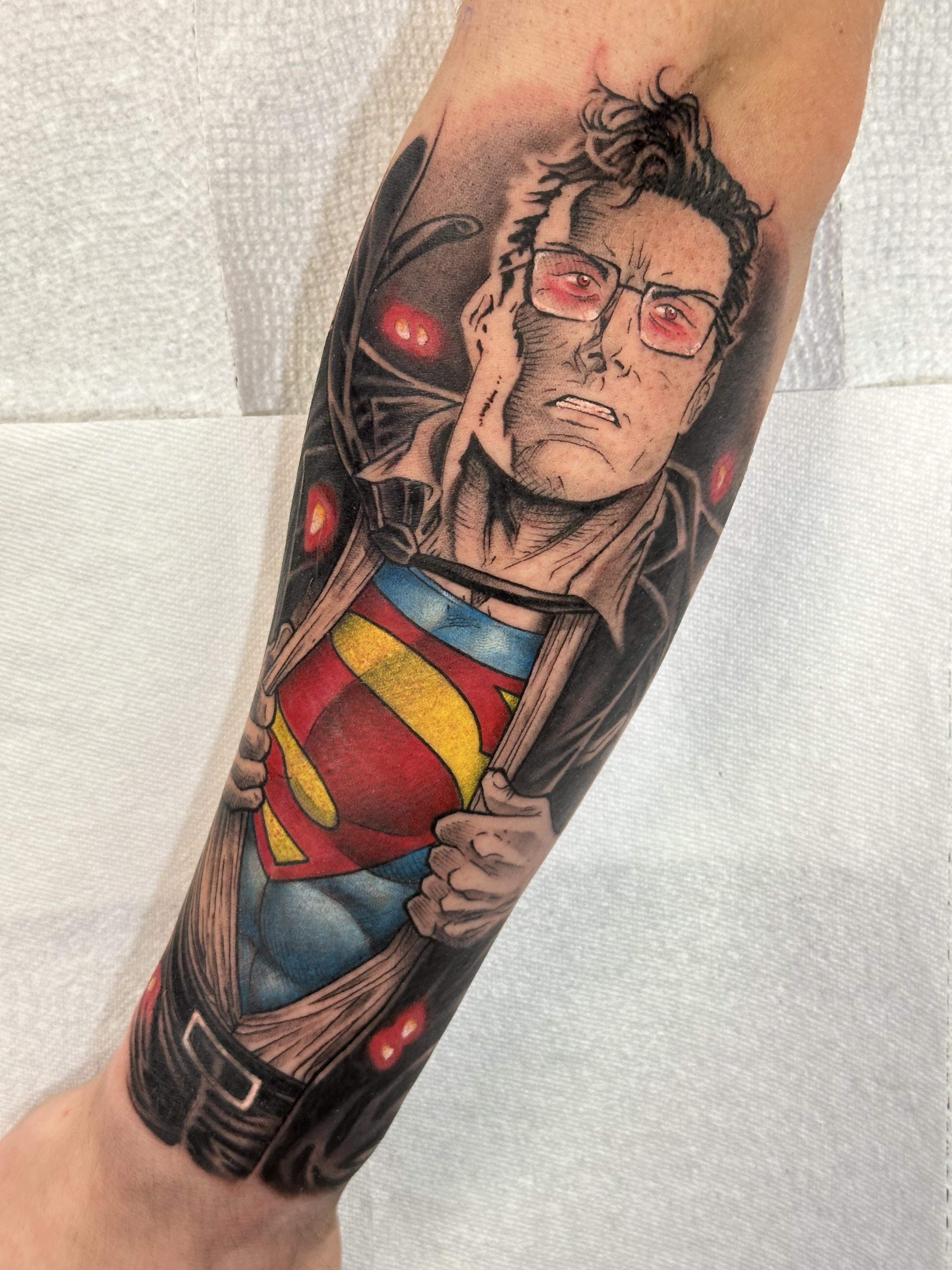 elegant superhero tattoo styles