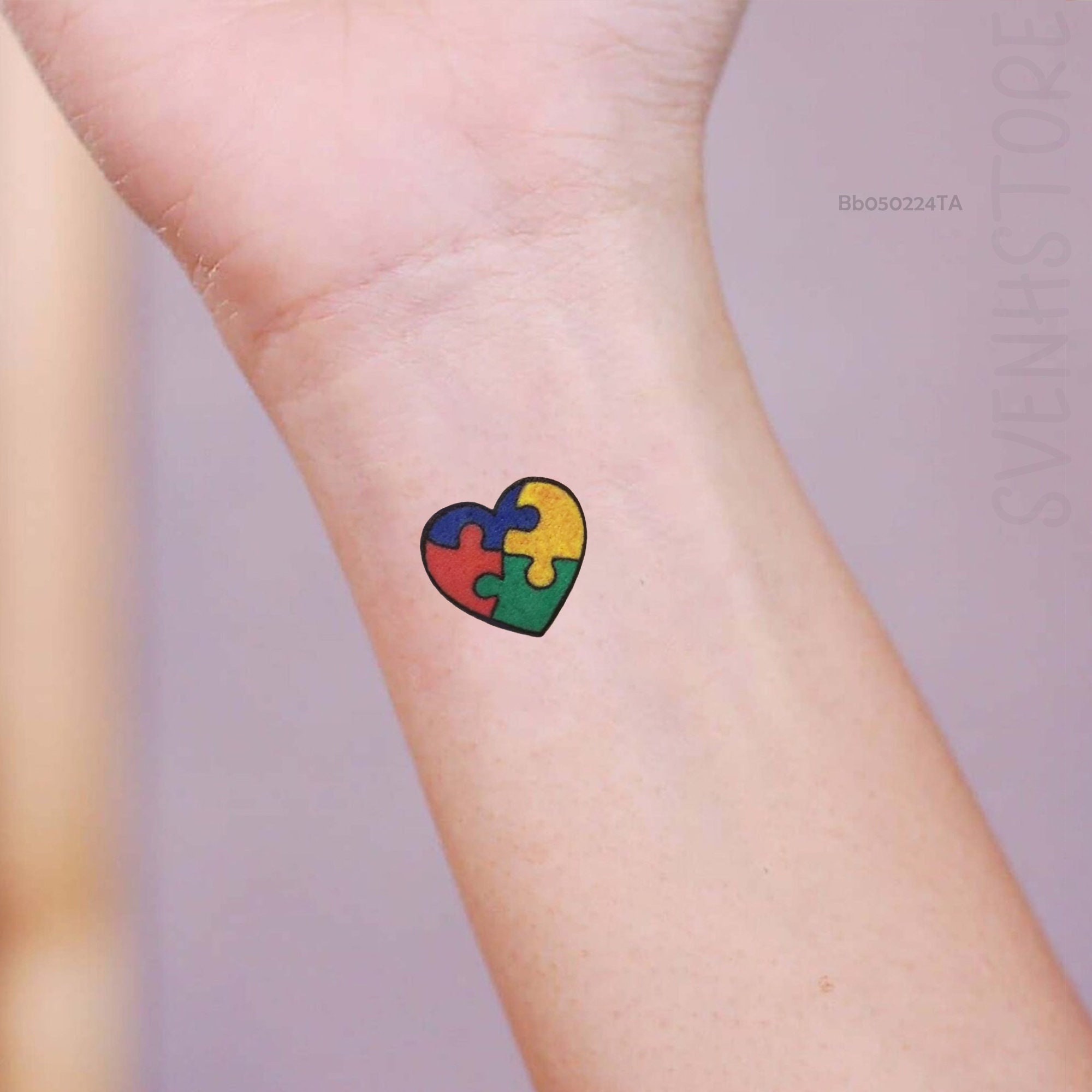 elegant tattoos expressing autism identity