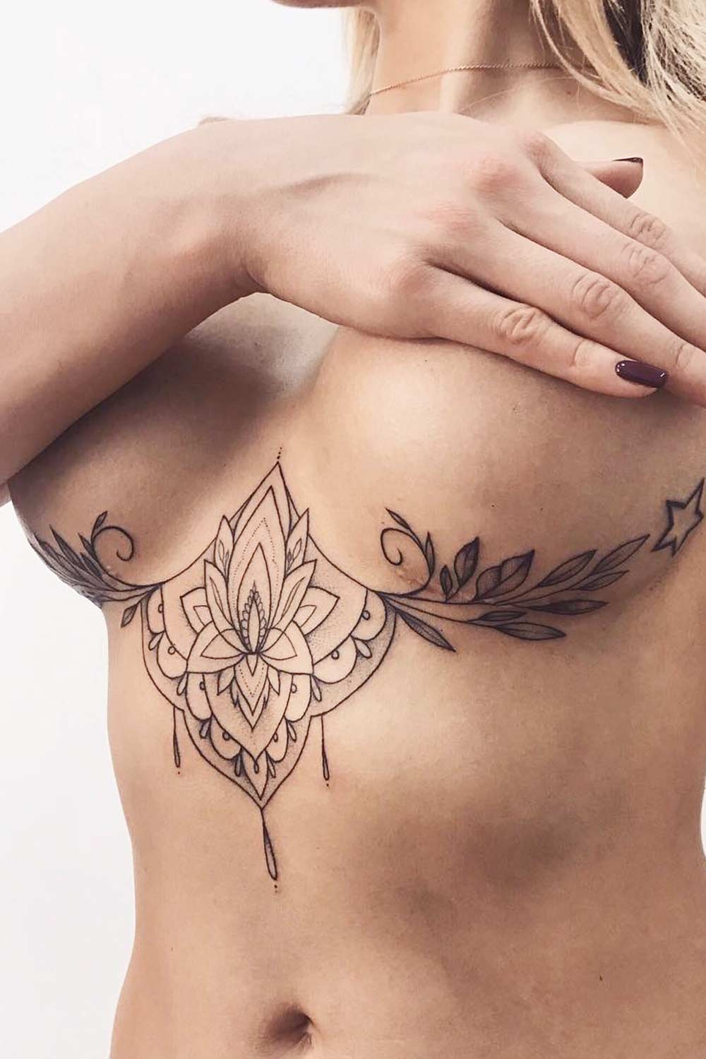 elegant under boob tattoo ideas.