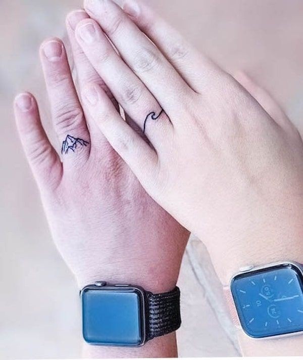 elegant wedding ring tattoos for couples