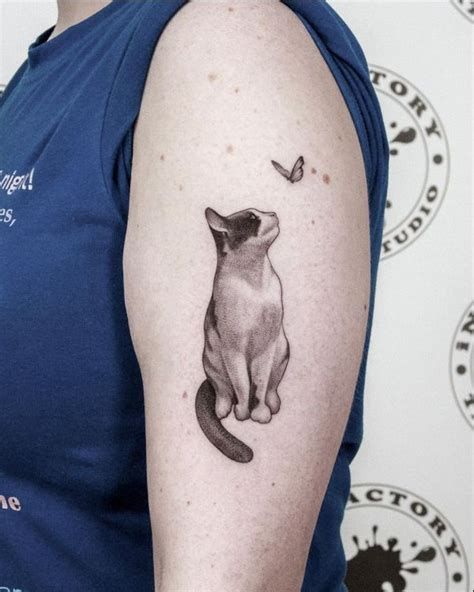 exquisite small cat tribute tattoo