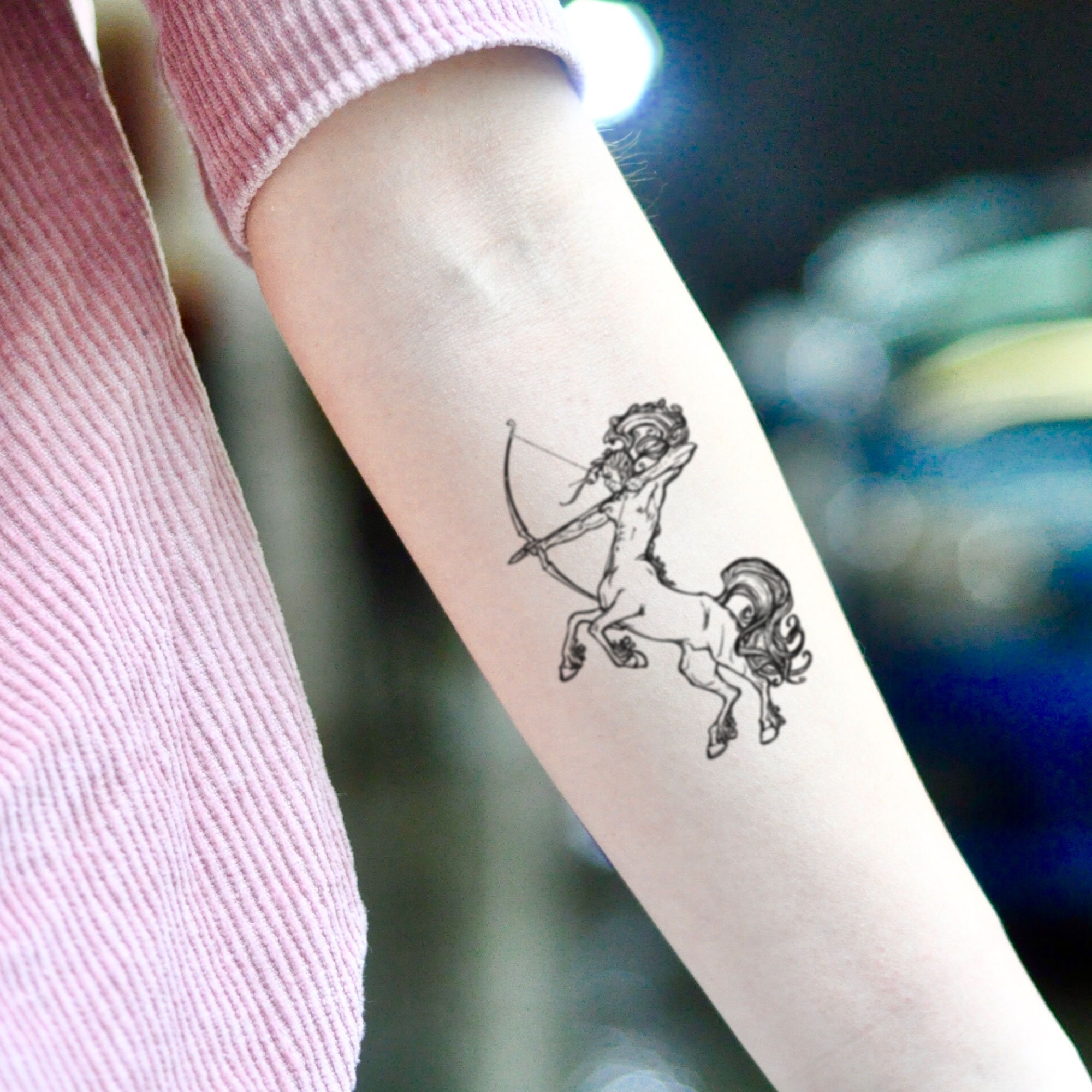 female small sagittarius tattoo 0014