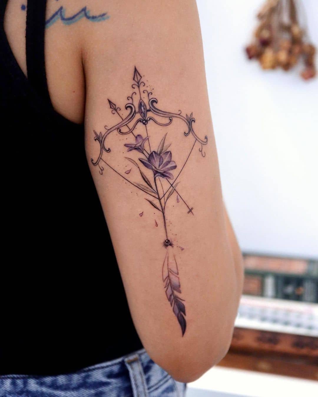 female small sagittarius tattoo 0036