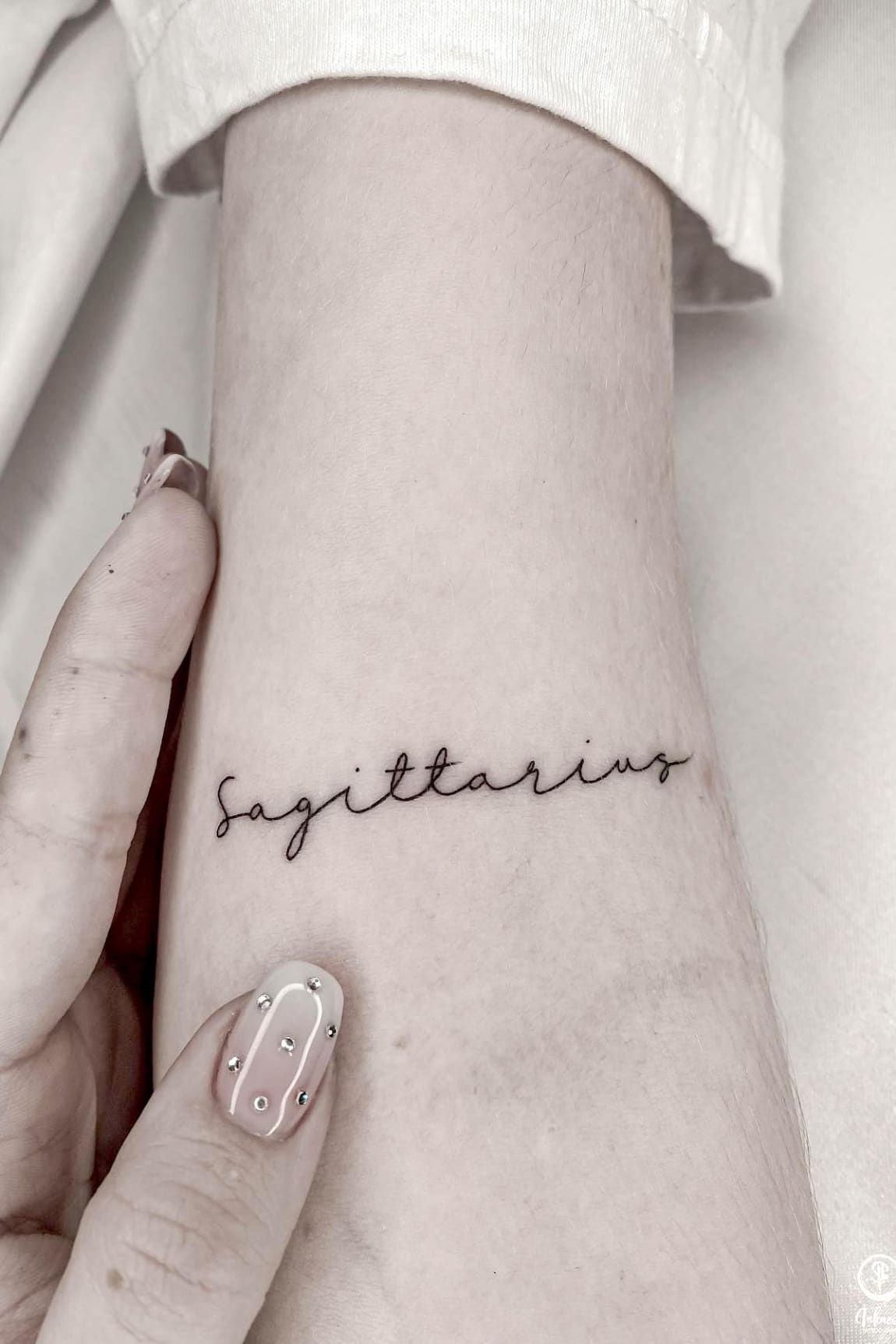 female small sagittarius tattoo 0039