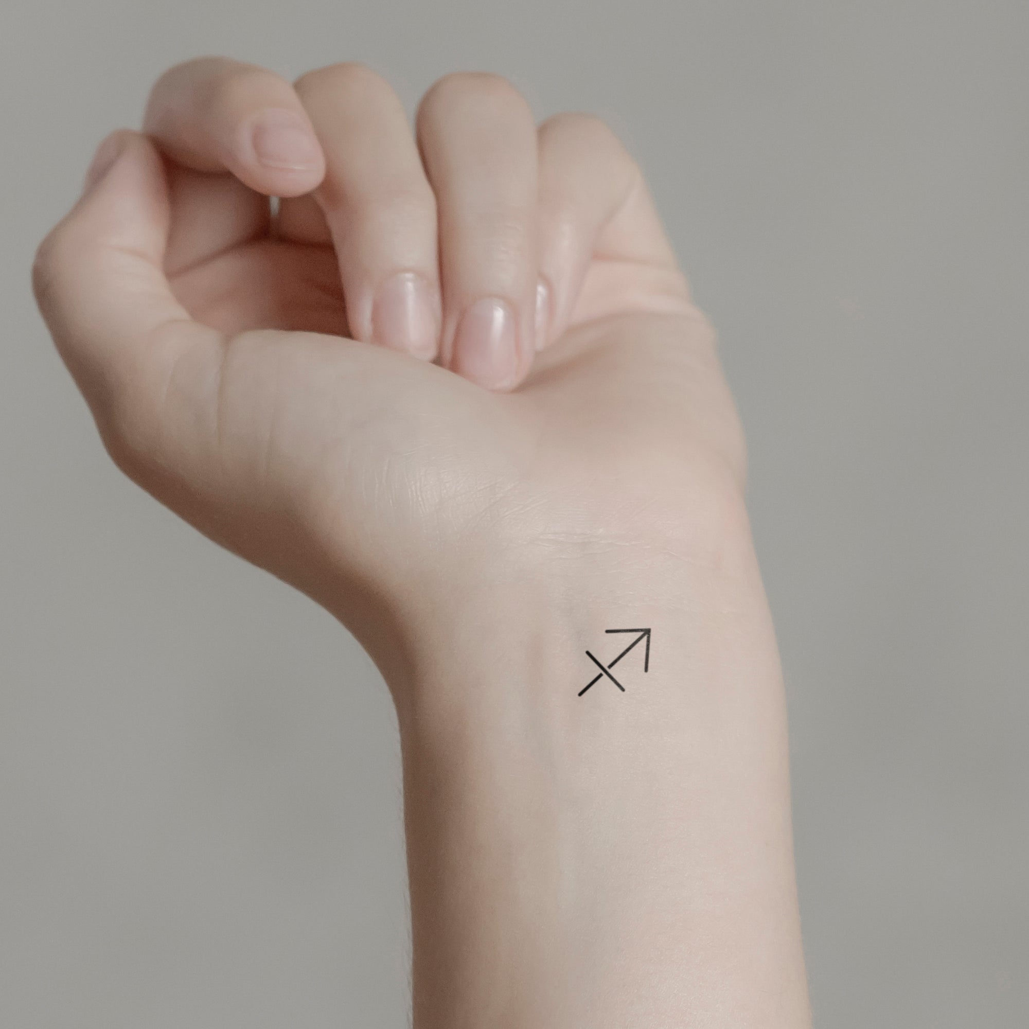 female small sagittarius tattoo 0043