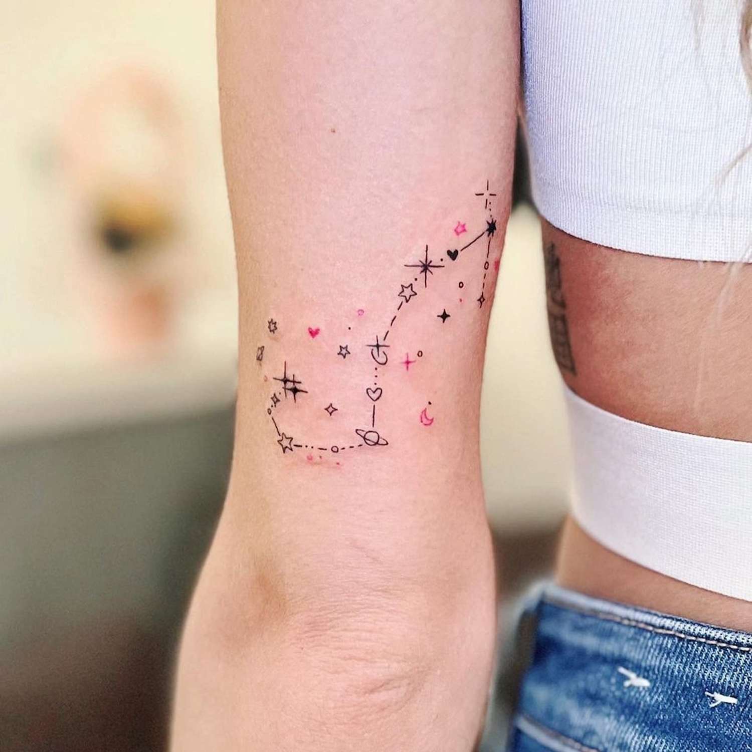 female small sagittarius tattoo 0046